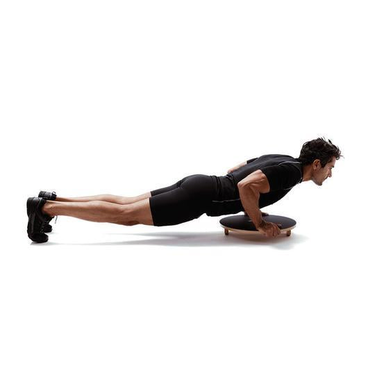 Core exercises on a balance board